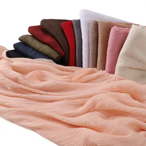 Detailed showcase of multi-color pleated tassel scarves, soft breathable fabric for daily styling.
