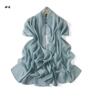 Solid color shimmering chiffon shawl detail view, lightweight breathable pleated scarf for women.