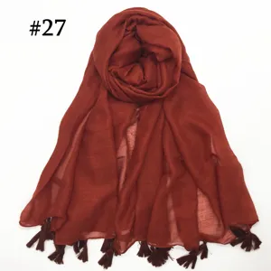 Lightweight solid color voile scarf with tassels, breathable and elegant draping style.