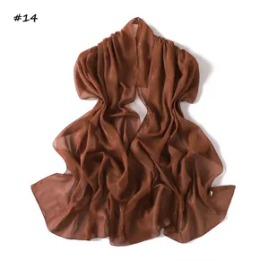 Detailed view of the solid color silver silk chiffon scarf, lightweight and breathable.