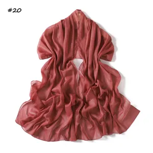 Silver silk chiffon scarf detail, lightweight breathable fabric with fine pleats.
