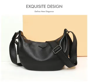Black leather hobo shoulder bag with adjustable strap, minimalist dumpling design for daily commute.