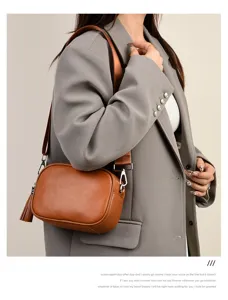 Genuine leather crossbody bag for women, stylish small square shoulder bag with wide strap.