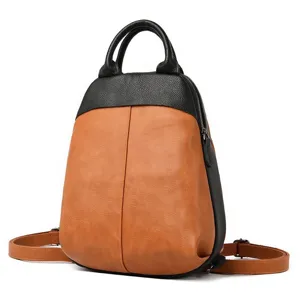 Detailed view of women color block leather backpack casual school travel daypack.