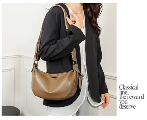 Stylish brown leather hobo shoulder bag for women, perfect for daily commuting and casual use.