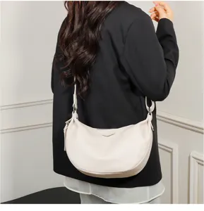 Minimalist off-white crescent shoulder bag for women, stylish dumpling crossbody bag for daily.