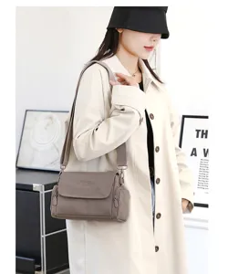 Detail view of the stylish women's crossbody bag with wide strap, perfect for daily commute.