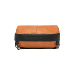 Leather backpack detail view, color-block design, premium material, close-up shot.