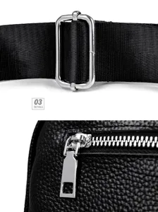 Detailed shot of black leather women's handbag strap buckle and silver metal zipper hardware.
