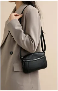 Black genuine leather crossbody bag, women's mini single shoulder bag with double zipper details.
