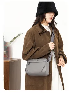 Casual women's nylon crossbody bag, trendy lightweight multi-pocket shoulder messenger bag.