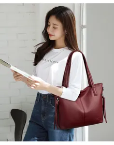 Large capacity wine red leather tote bag for women, stylish shoulder bag with double straps.