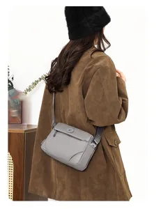 Casual women grey nylon crossbody bag, stylish daily shoulder bag for travel use.