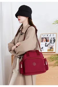 Womens casual nylon shoulder bag with multiple pockets, large capacity daily tote and handbag.