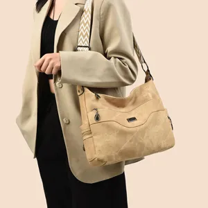 Stylish women's soft leather casual shoulder bag with wide strap, large capacity tote.