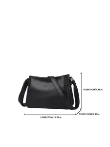 Black leather shoulder bag detail showing dimension specifications and textured leather finish.
