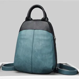 Two-tone genuine leather backpack for women, retro casual school bag and stylish travel purse.