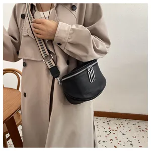 Black genuine leather saddle bag, chic crossbody shoulder bag with wide strap.
