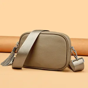 Genuine leather women camera bag detail view, fashion casual crossbody bag with wide strap.