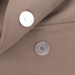 Minimalist women crossbody bag metal magnetic snap detail, casual daily commuter style.