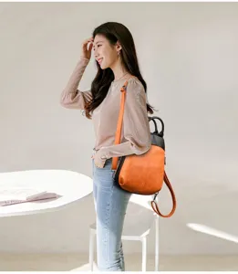 Two-tone genuine leather women backpack, retro campus style, versatile shell handbag.