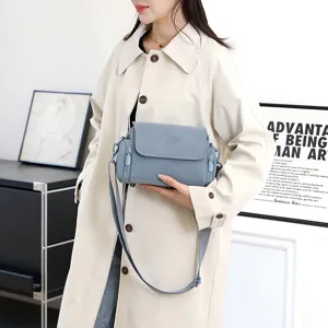Casual minimalist women's crossbody bag with adjustable strap for stylish daily commute.