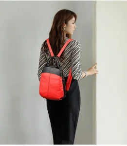 Stylish color-blocked genuine leather women backpack, retro casual shell school bag for daily use.