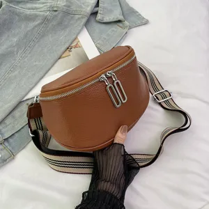 Stylish genuine leather saddle bag for women, retro brown crossbody bag with wide strap.