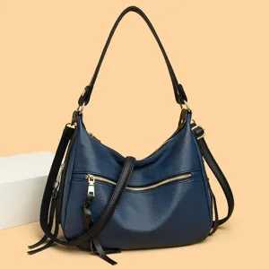 Dark blue leather shoulder bag for women, large capacity crossbody bag with zippers.