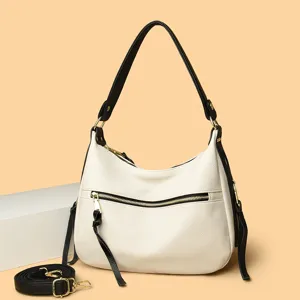 Fashionable solid color casual shoulder handbag with large capacity and elegant design details.