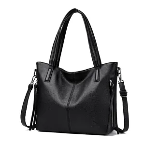 Black PU leather large capacity women shoulder handbag casual commuter tote bag with side zippers.