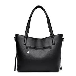 Classic black leather tote bag with large capacity, soft texture and stylish design for daily use.