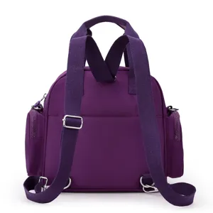 Women nylon backpack casual shoulder bag large capacity purple stylish everyday use.