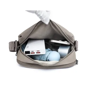 Nylon casual shoulder bag detail showing interior capacity, lightweight and practical.