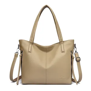 Elegant women's PU leather tote bag with shoulder strap, large capacity and stylish design.