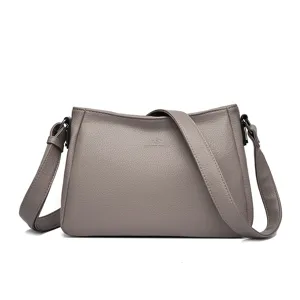 Womens grey leather crossbody bag, stylish casual shoulder bag for daily use and travel.
