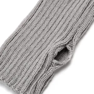Detailed macro view of winter grey ribbed knit fingerless arm warmers showing thumb hole texture