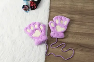 Close-up detail of fluffy purple cat paw gloves with soft pads and hanging neck string.