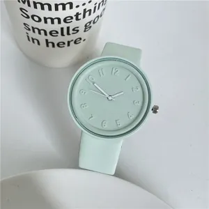 Minimalist macaron silicone quartz watch for students, fresh light green daily timepiece.
