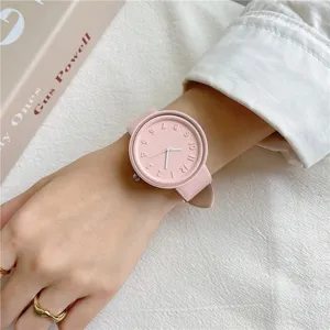 Minimalist pink silicone watch for students, stylish everyday casual quartz wristwatch.