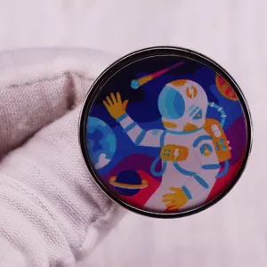 Space astronaut spaceship metal badge pin accessory, detailed close-up shot of round brooch.