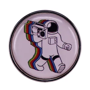 Cute space astronaut enamel lapel pin featuring a retro boombox and colorful rainbow trail.