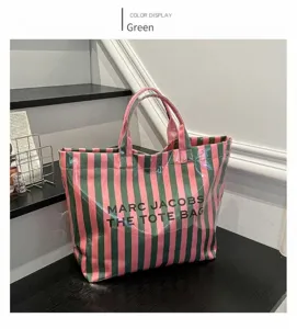 PVC striped tote bag for women, large capacity waterproof commuter handbag, detail view.
