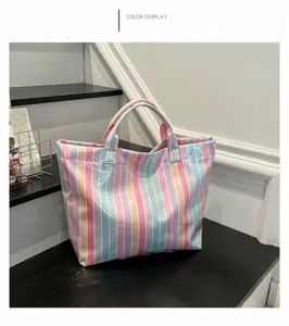 PVC striped large capacity tote bag detail view, casual waterproof shoulder handbag.