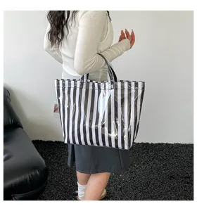 Large capacity black white striped transparent PVC tote bag, stylish commuter shoulder handbag.