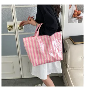 Chic pink and white striped PVC clear tote bag, waterproof large capacity shoulder handbag.