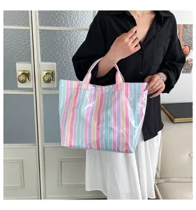 Colorful striped PVC tote bag for women, large capacity waterproof casual daily shoulder bag.