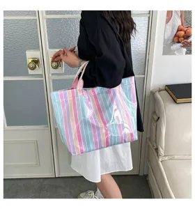 PVC striped tote bag detail showcasing colorful vertical stripes and transparent design.