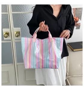 PVC striped large capacity tote bag women waterproof commuter casual shoulder handbag.