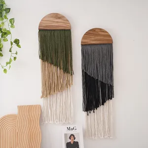 Boho macrame wall hanging with wood top, multi-layer gradient tassel decor for cozy living room.